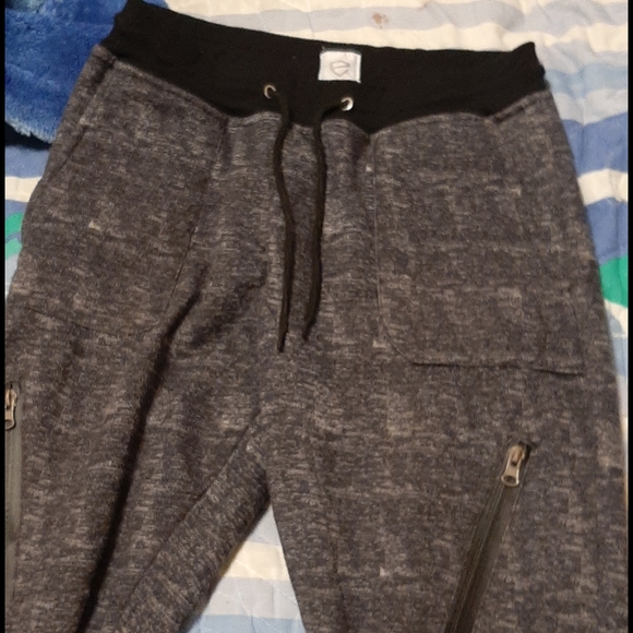 encrypted Other - A pair of sweat pants